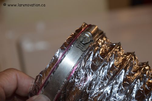 Photo du collier de serrage d'un tuyau de sécheuse