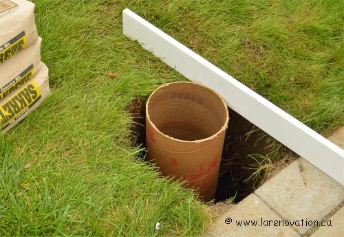 Positionnement du tube de carton dans le trou