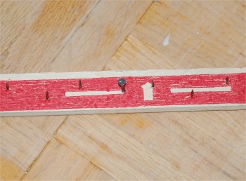 Photo d'une bande � griffes pour retenir le tapis