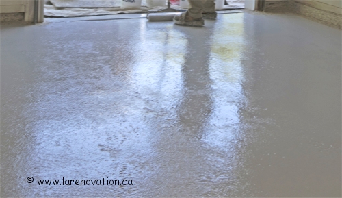 Application du produit de polyur�a sur plancher de ciment