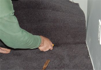Photo de la coupe d'un coin dans un tapis