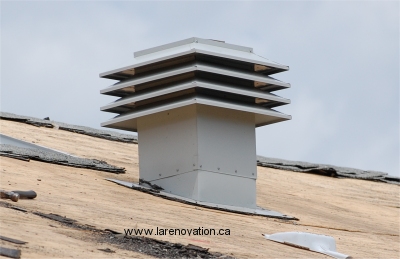 Photo d'une ventilation une fois le bardeau du toit enlev�
